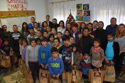 Părintele Episcop Lucian alături de copiii și persoanele vârstnice de la centrele sociale din Reșița