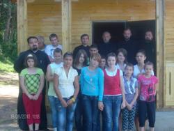 Hristos împărtășit copiilor în parohia „Sfinții Împărați Constantin și Elena” din Anina